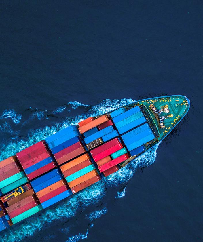 Colorful container ship in the ocean photographed from above | logistics solutions | Seacon Logistics