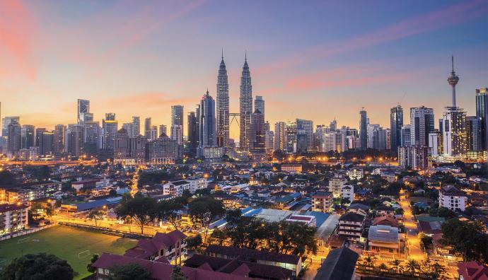 Overview photo of the Malaysian city of Kuala Lumpur showing the Petronas Twin Towers and the Kuala Lumpur Tower | Transport Malaysia | Seacon Logistics
