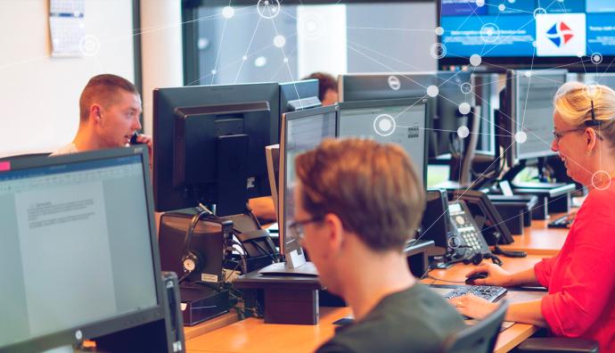 Employees at work in the office, solutions for intermodal transport | Seacon Logistics