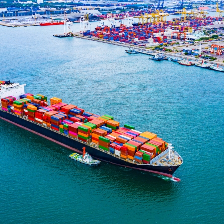 Colored containers on container ship in clear blue sea |  Sea Freight | Seacon Logistics