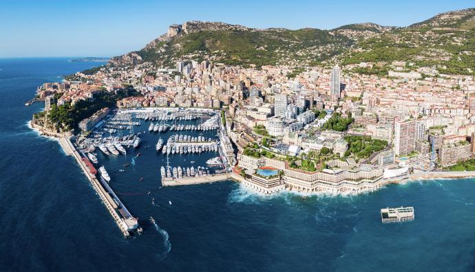 Aerial view of Monte Carlo showing port with luxury ships and views of the city | Transport Monaco | Seacon Logistics