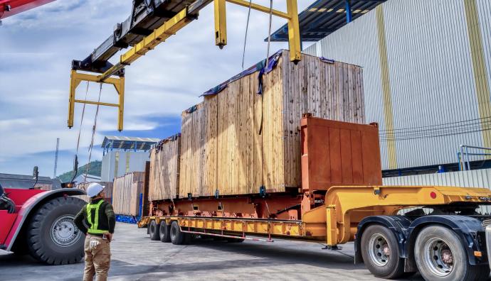 Loading special transport onto a truck. | Seacon Logistics