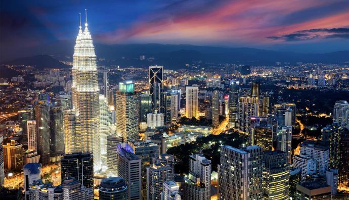 Aerial view of the Malaysian capital Kuala Lumpur in the evening | Transport Malaysia | Seacon Logistics