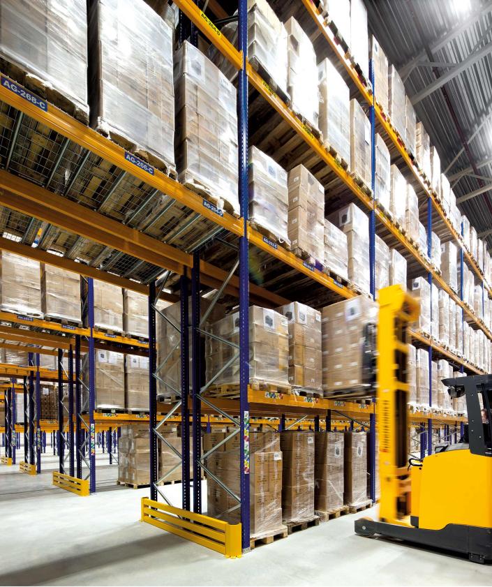 Yellow warehouse with moving forklift | logistics solutions | Seacon Logistics 